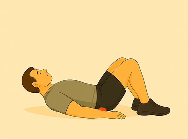 Ball under lower back